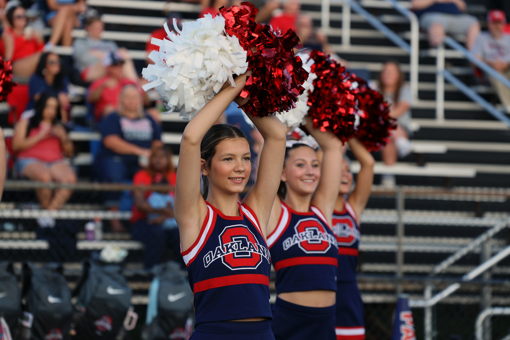 cheerleaders root for team