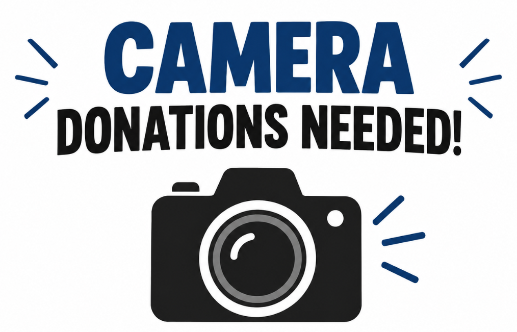 A black camera icon on a white background. Text above and below reads "CAMERA DONATIONS NEEDED!" in blue.