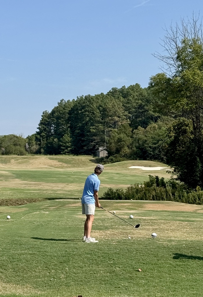 Golfer looks ahead at his next hit