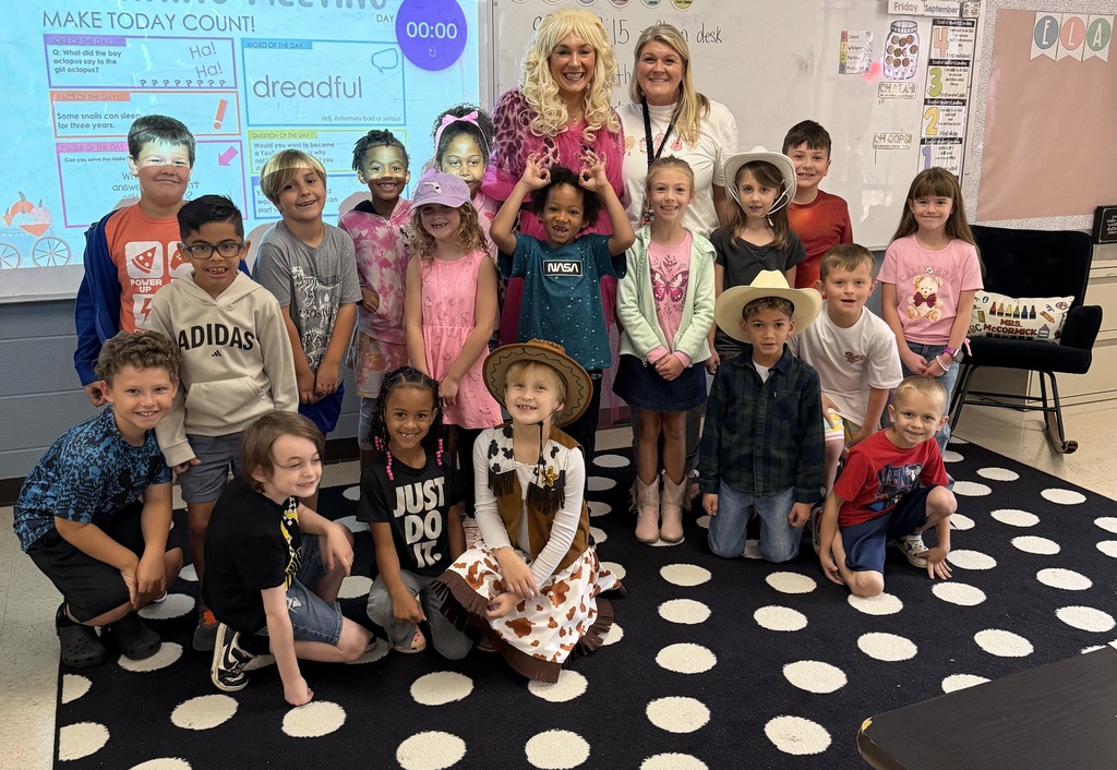 Dolly dropped in today to take some pictures with our Wildcats! Happy 9-2-5!