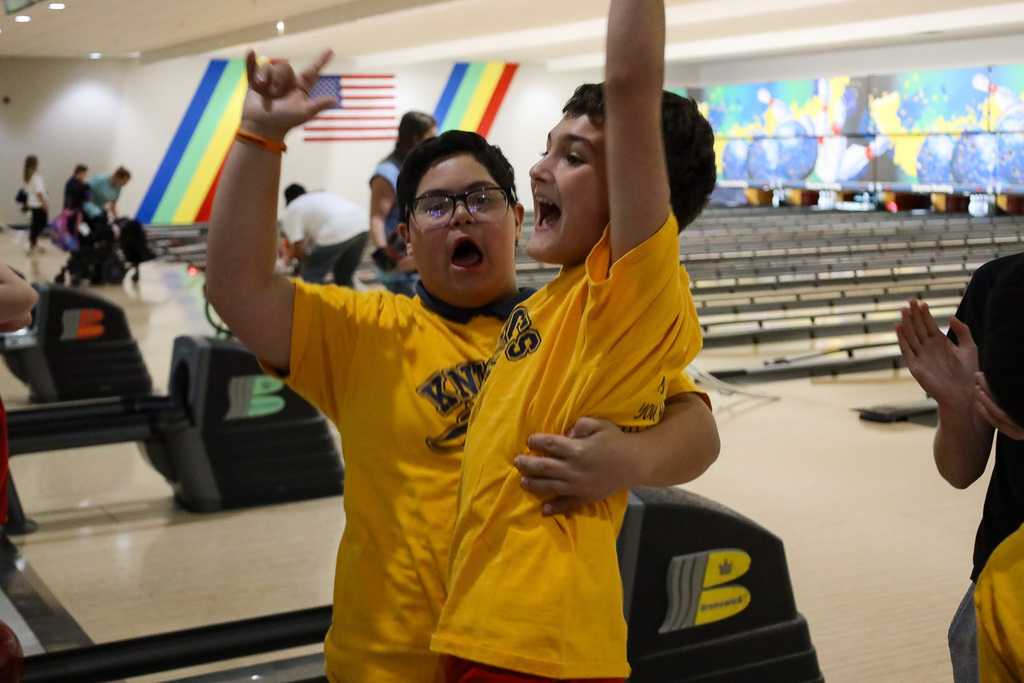 Two students celebrating
