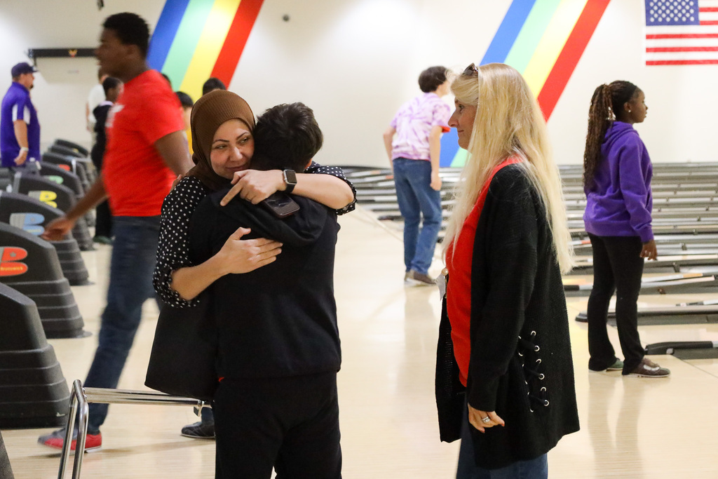 Two people hugging