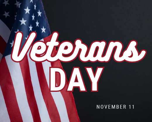 Black background with text "Veterans Day" and a flag. The flag has red, white, and blue stripes.
