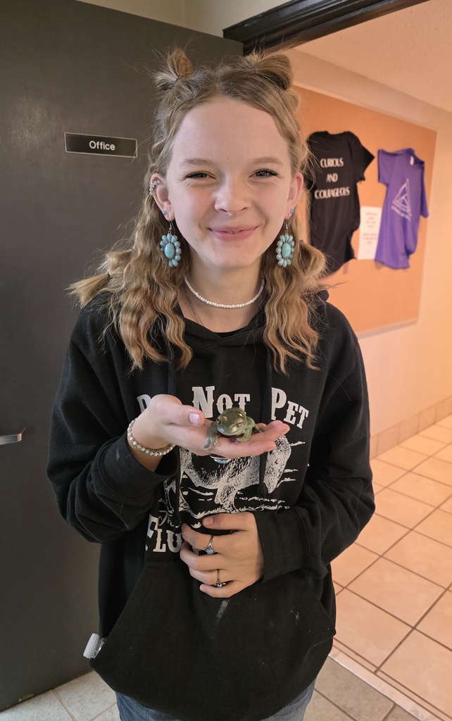 student with frog
