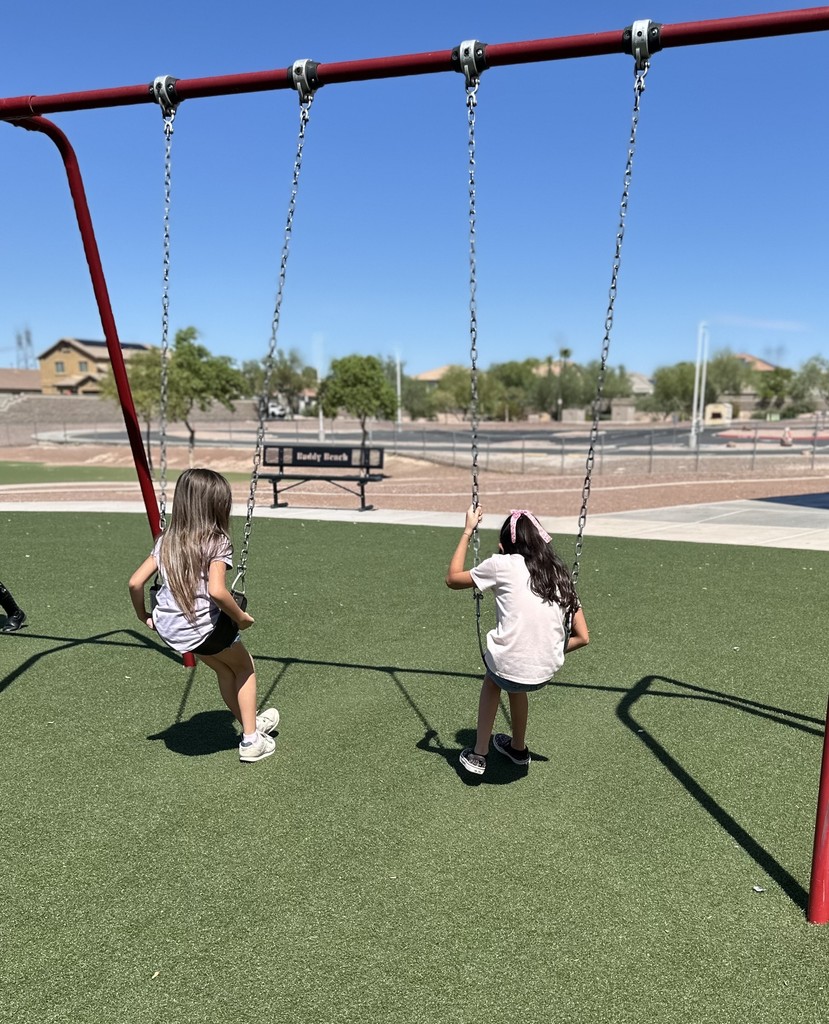 Chatting on the swings!