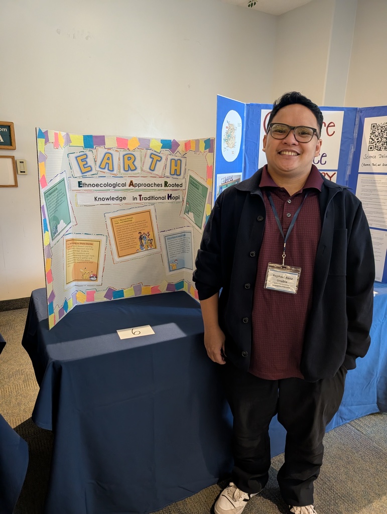 Mr. Unabia with his poster presentation