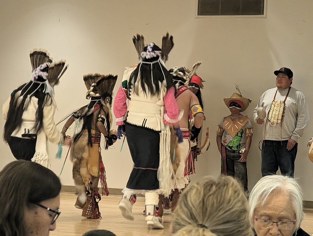 Native dancers at lunch