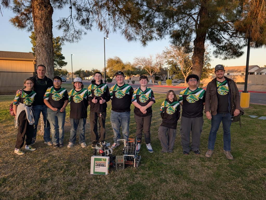 Both teams with their robots