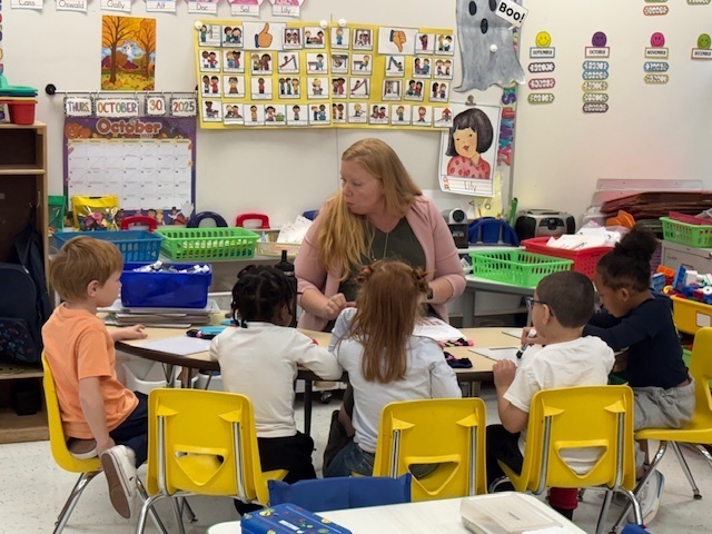 desk, students, yellow chairs