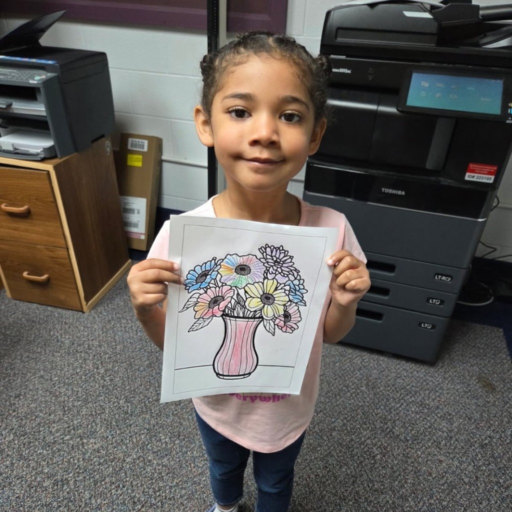 Family Service Advocates at Valley Preschool love when students come to say hello and show off their artwork. 