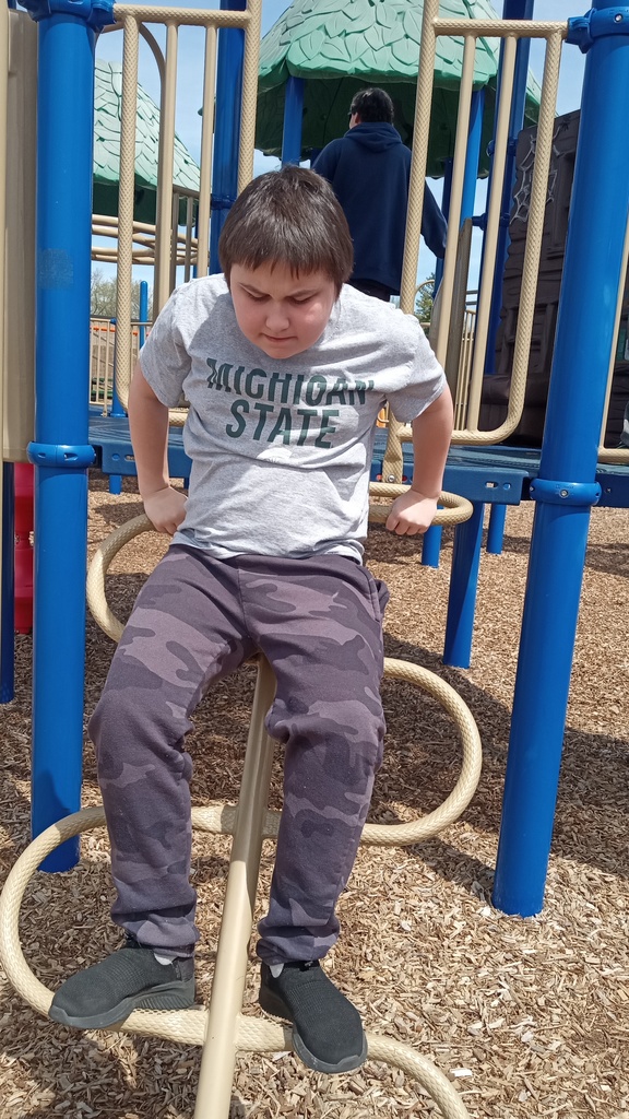 Isaac playing hard in his MI State shirt