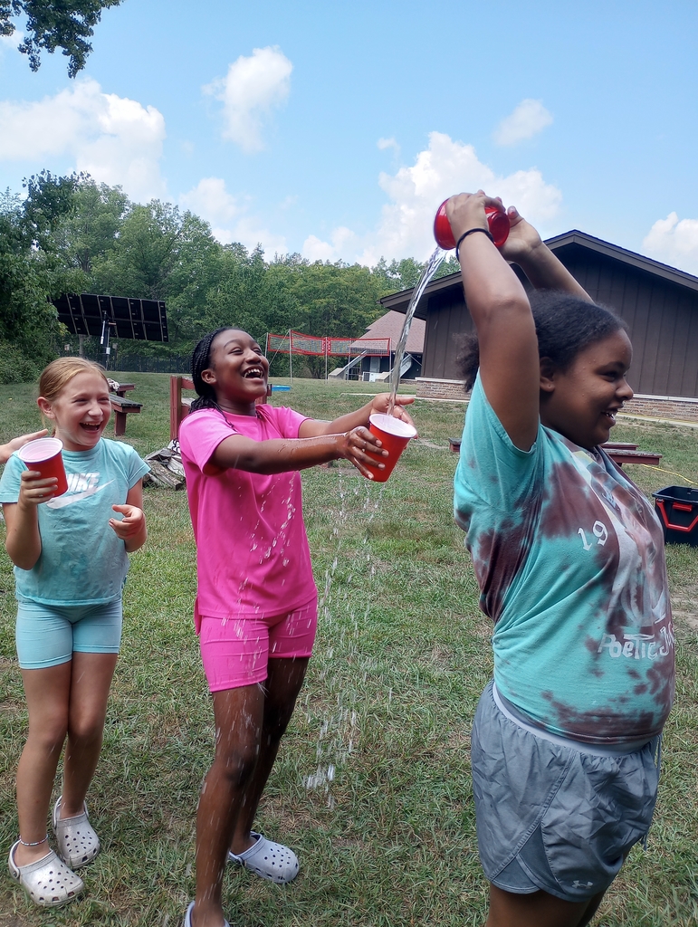 Students playing with water.