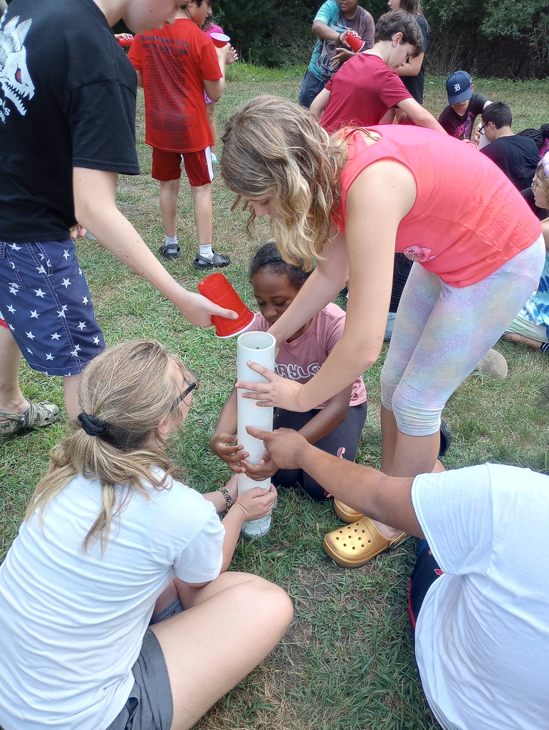 Students playing with water.