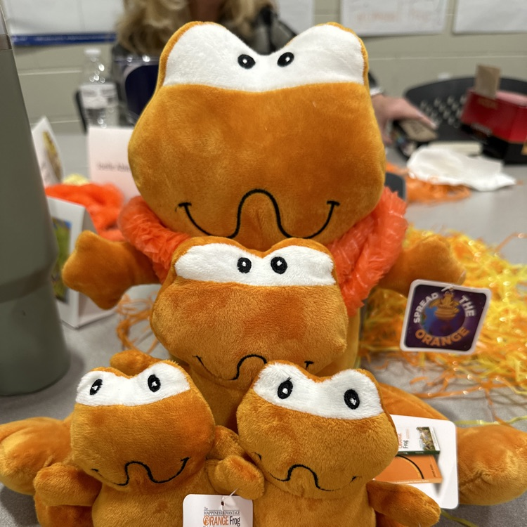 Four Orange Frogs