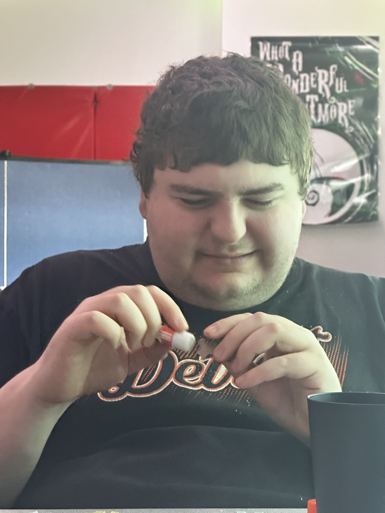 Student glues puzzle piece