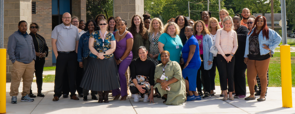Photograph of Jerome teachers standing at entrance. 