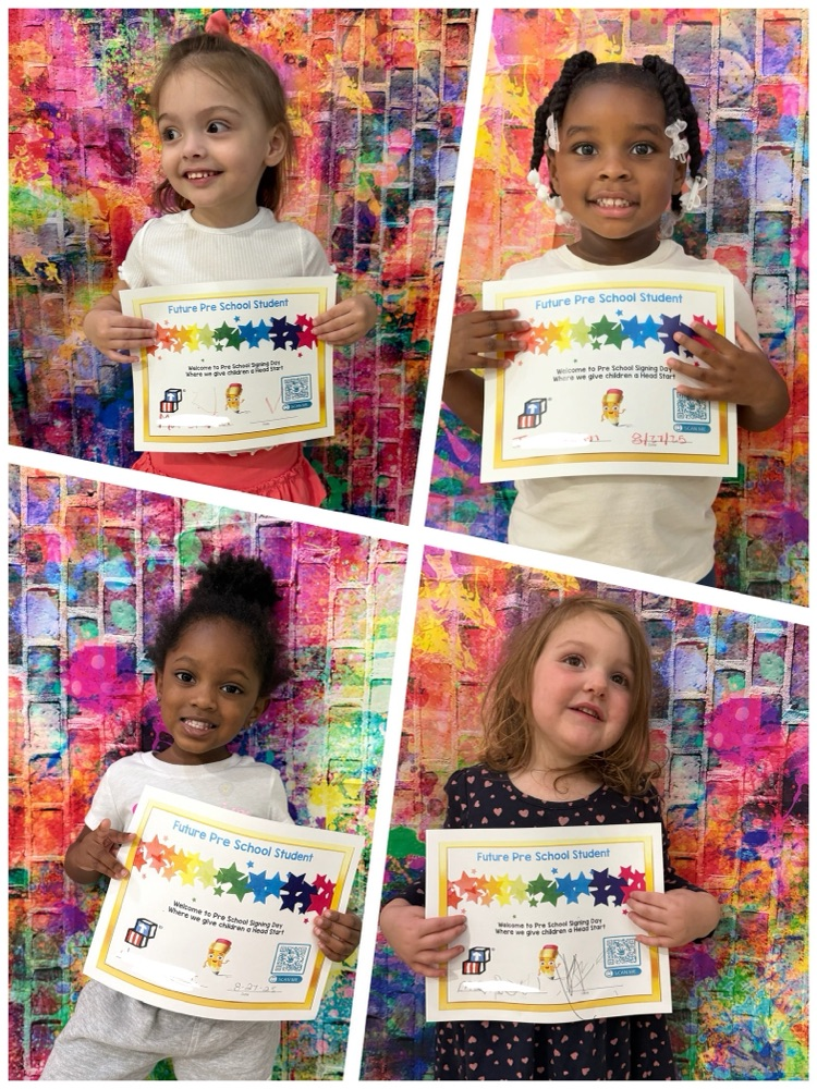preschoolers holding up their certificates 