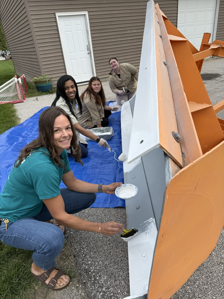 Painting the base coat of the plow blade
