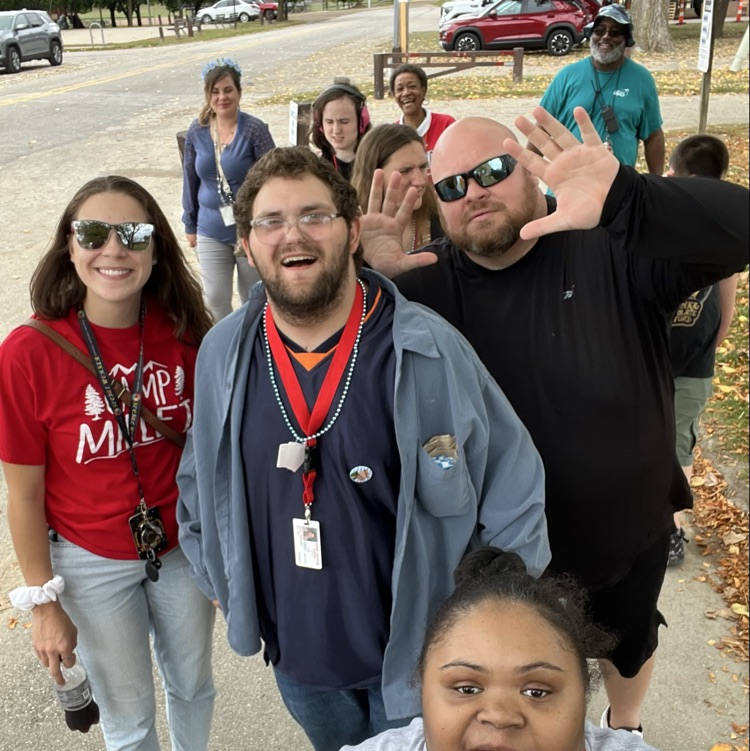 smiling men and women