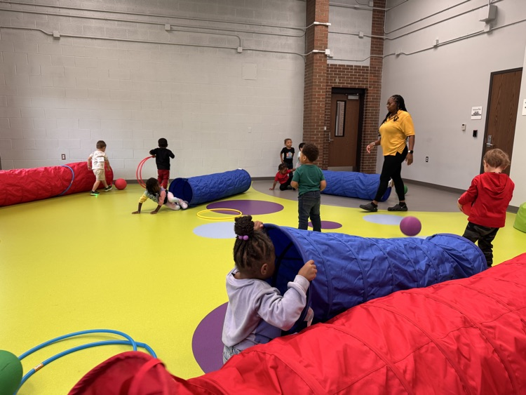 students playing in activity room.