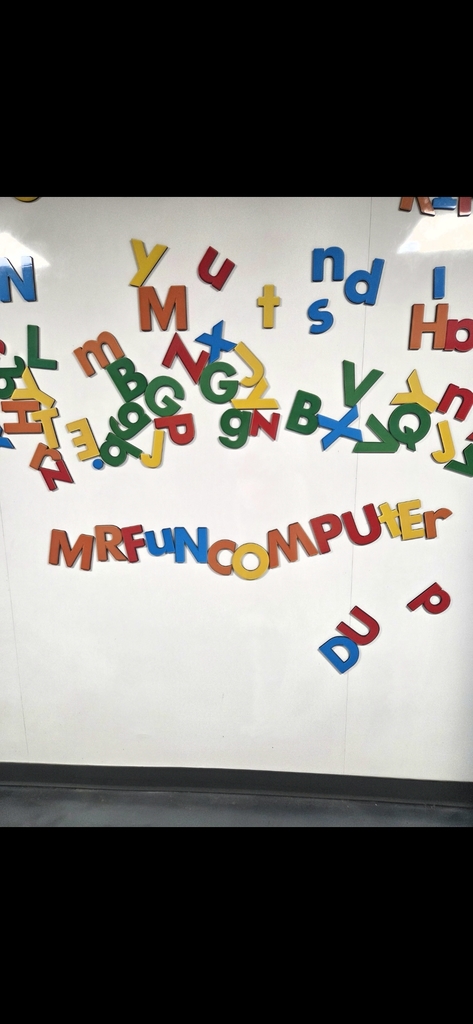 One of our incredibly bright Jerome Preschool students independently wrote Mr. Fun Computer on the magnetic wall in the hallway during a transition.