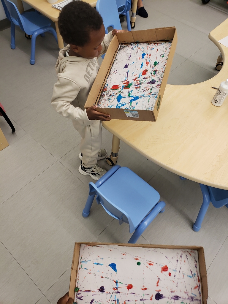 Students in Ms. Dawn Rohde's classroom at Jerome Preschool got to participate in marble painting. It was difficult at first to figure out how to maneuver the balls through the paint in a controlled manner, but the children mastered it! #OurStory #SaginawISD
