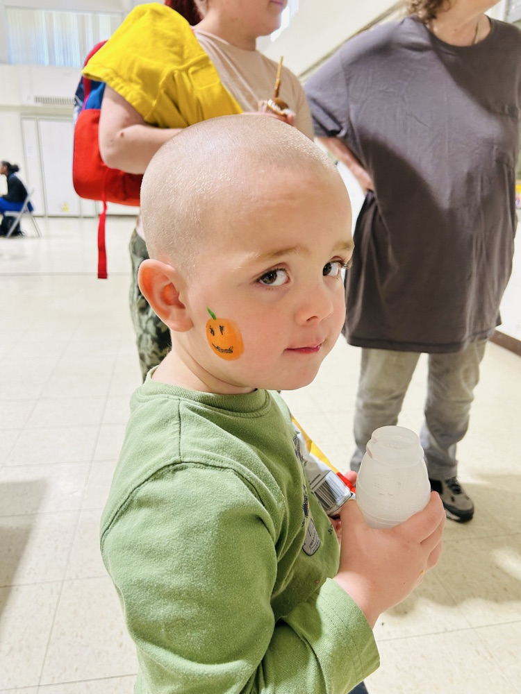 He’s showing off his face painting.