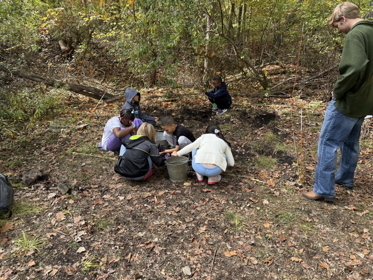Kids looking for artifacts at Hartley