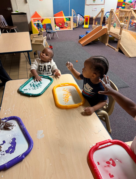 Student enjoying sensory play