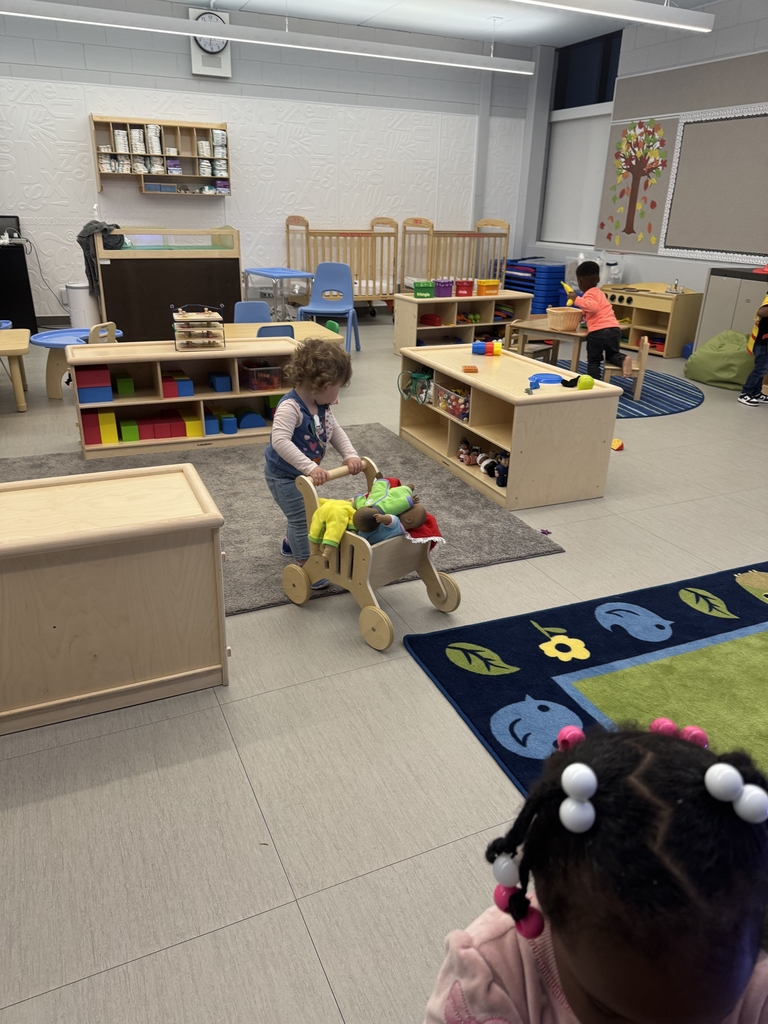 Children working in EHS room.