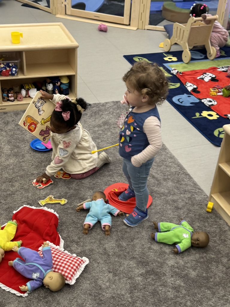 EHS students engaged in dramatic play.