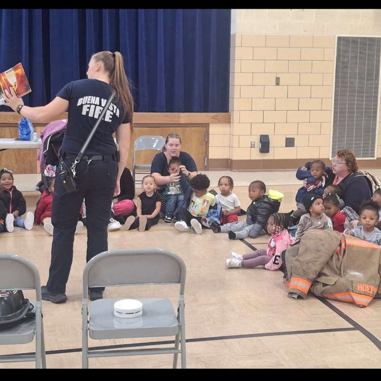 Early Head Start children enjoying fire safety story time