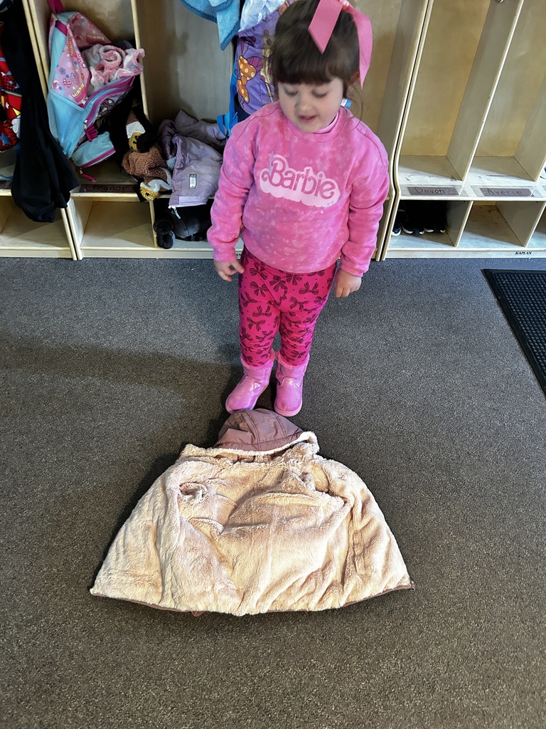 flip trick-lay your coat down and stand at the top 