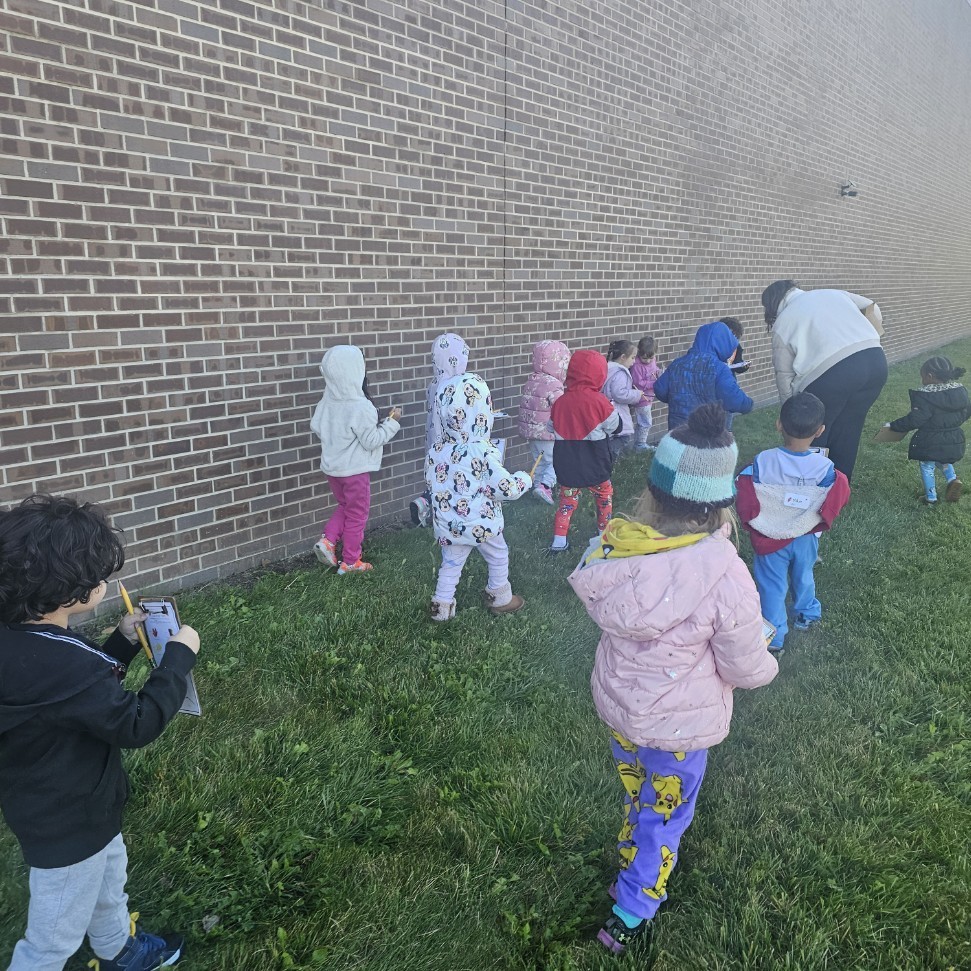 kids walking in a line.