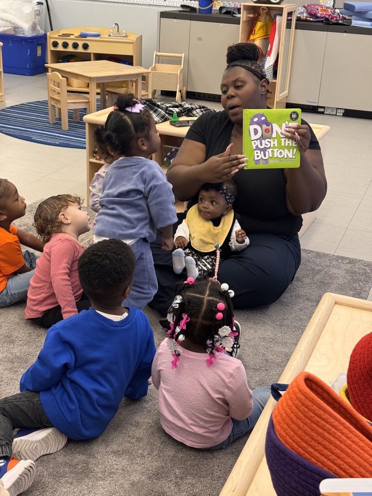 Students settling in for today's read-aloud. 