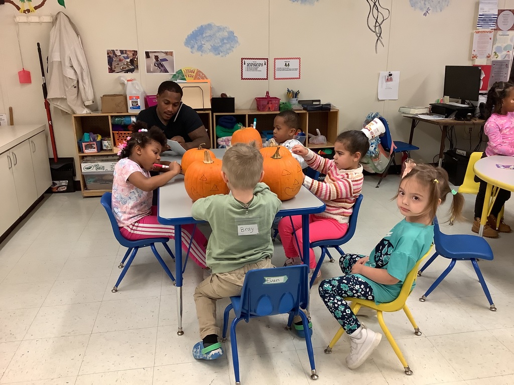 Pumpkin fun  for the children in Ms. Jeanette's and Ms. Ta'Teiona classroom at the Brucker ISD Head Start Center. Dad's and one sister assisted the children with decorations.  Also the children decorated a pumpkin for our new Principal  Stephanie Ecikholt.
