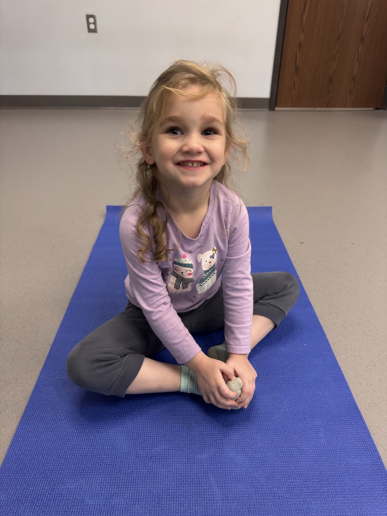 Students doing yoga.