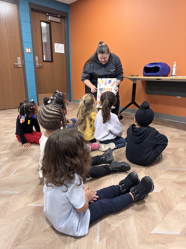 Students talking about healthy hand washing habits. 
