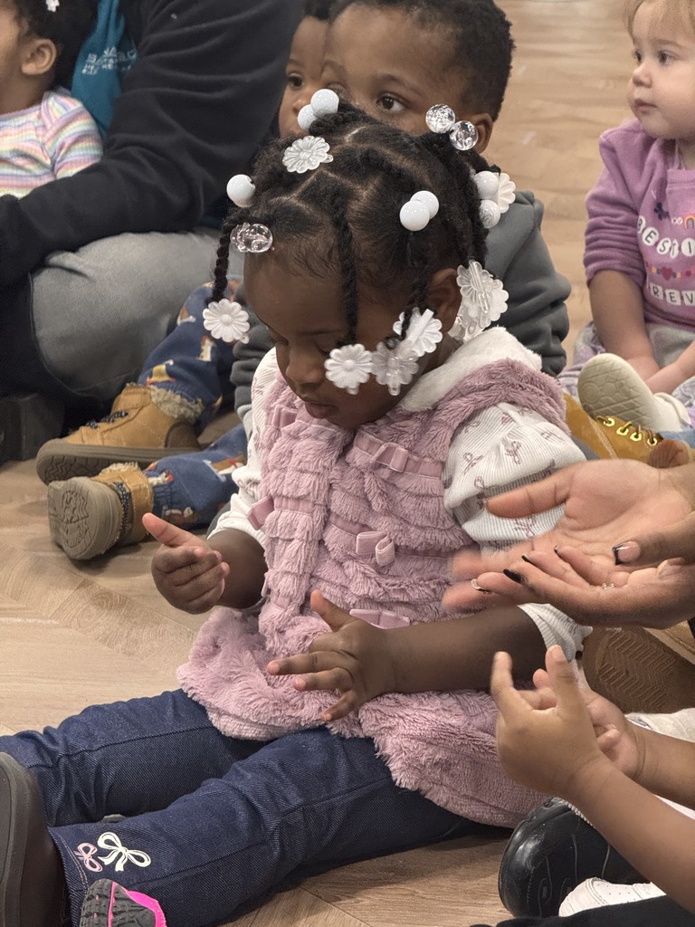 Student practicing wash her hands. 