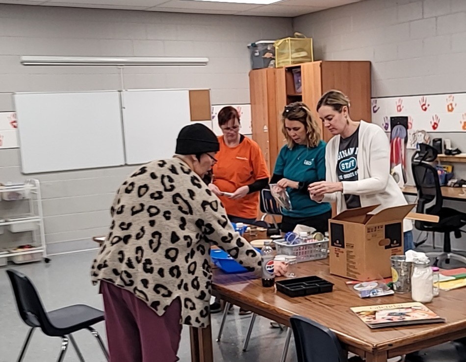 sorting the art room.