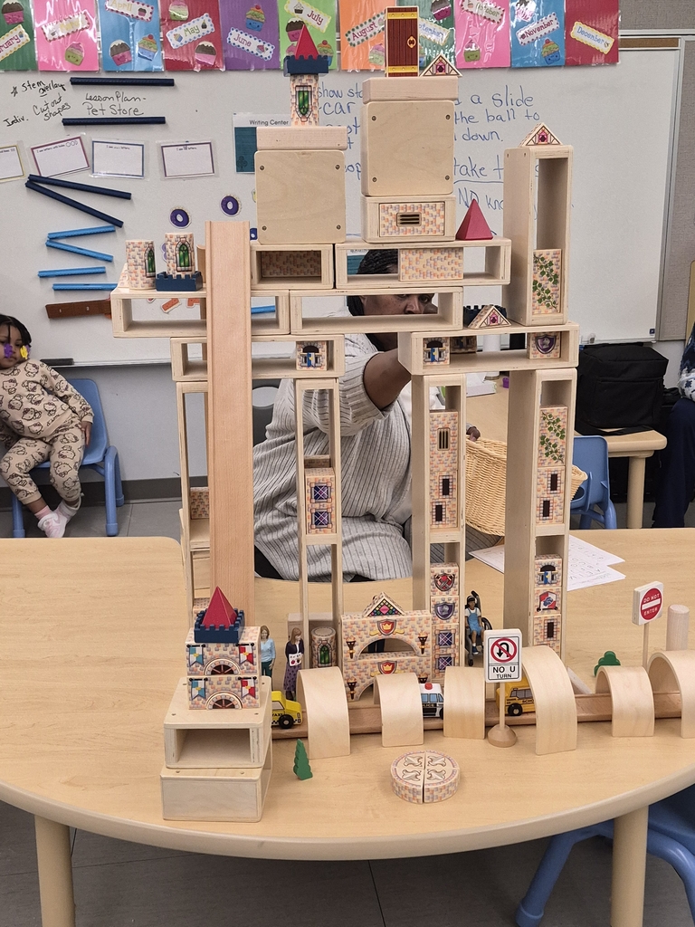 Students engineering towers. 