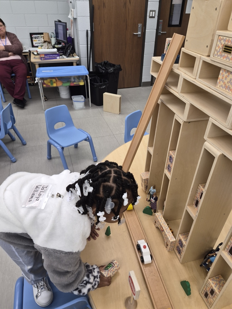 Students engineering towers. 