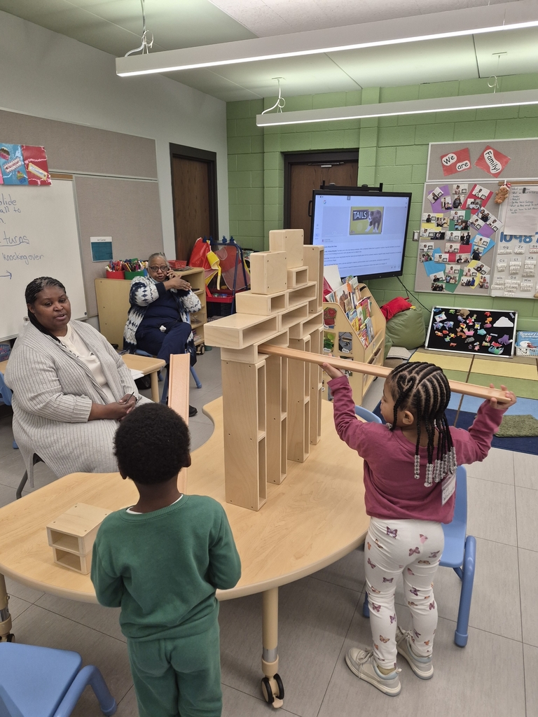 Students engineering towers. 