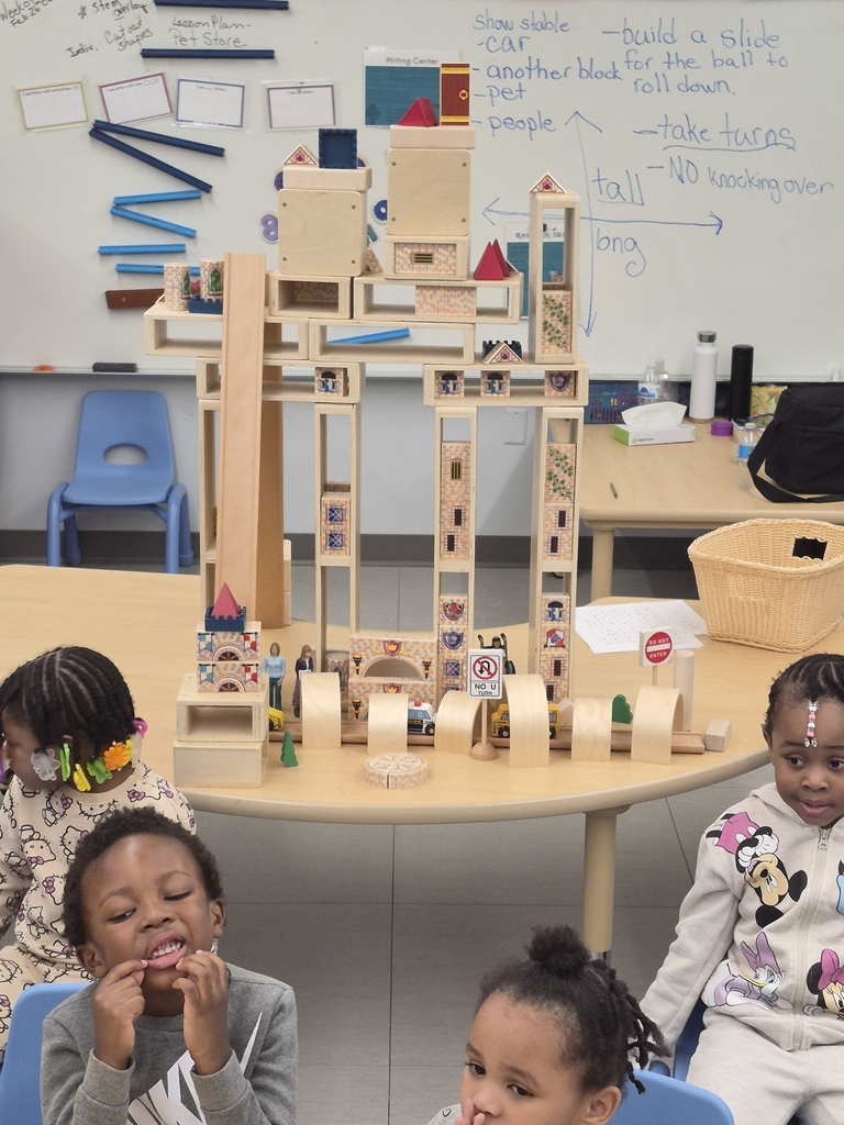 Students engineering towers. 