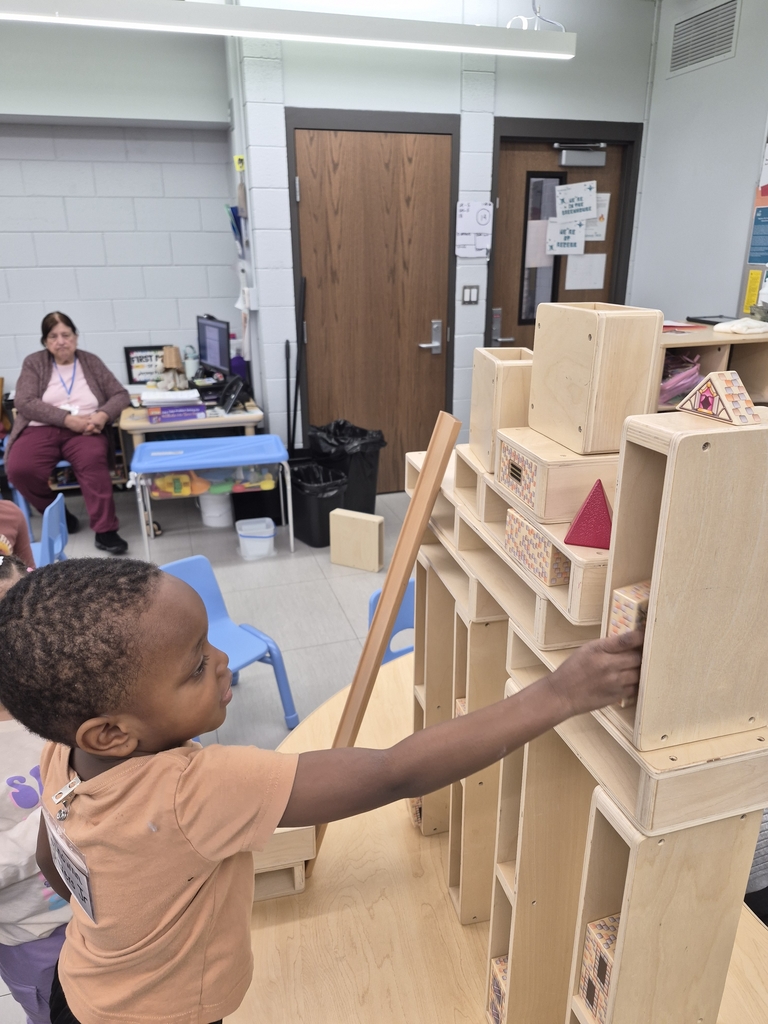 Students engineering towers. 