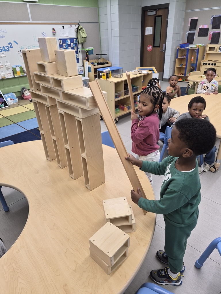 Students engineering towers. 