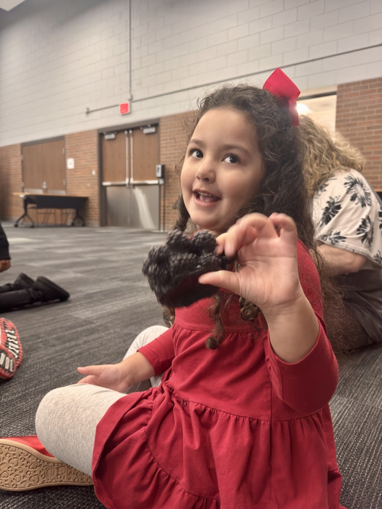 students exploring different foods. 