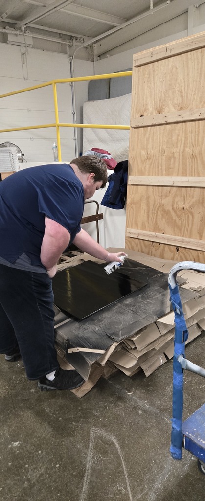 Student Painting Wood