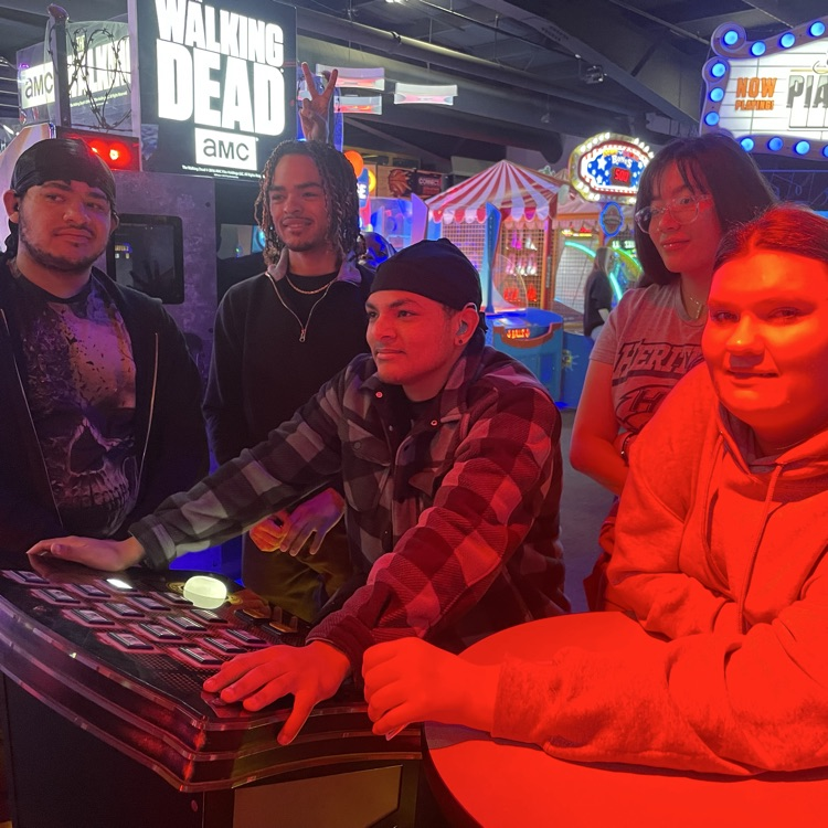 teenagers playing video game