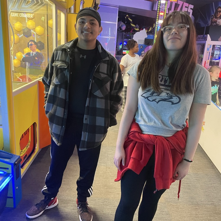 two teenagers smiling